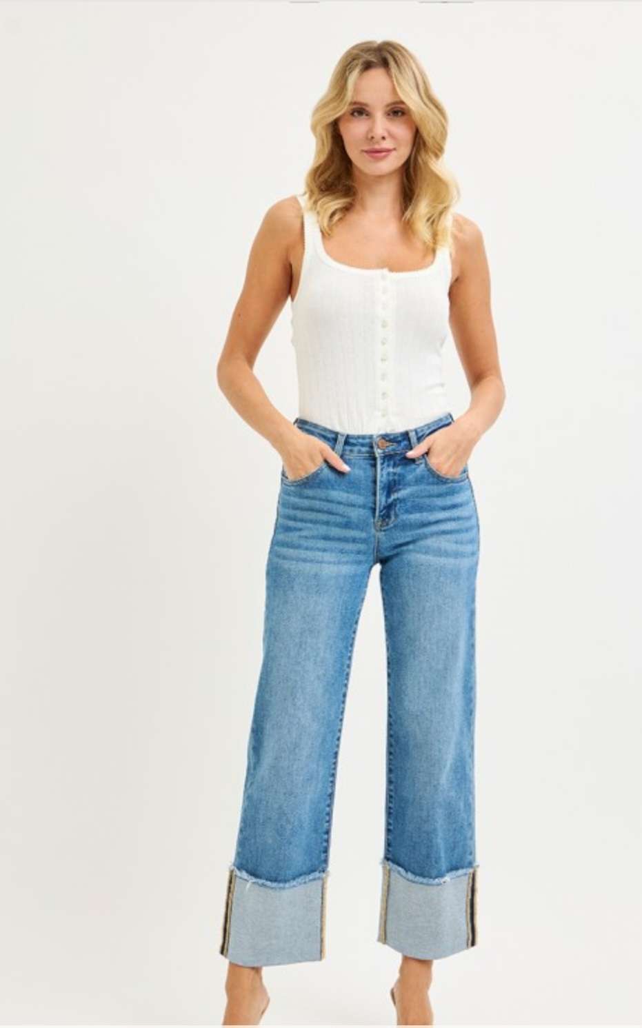 Mid rise crop wide cuff jeans for women in light blue denim, featuring relaxed fit and trendy cropped wide leg design.