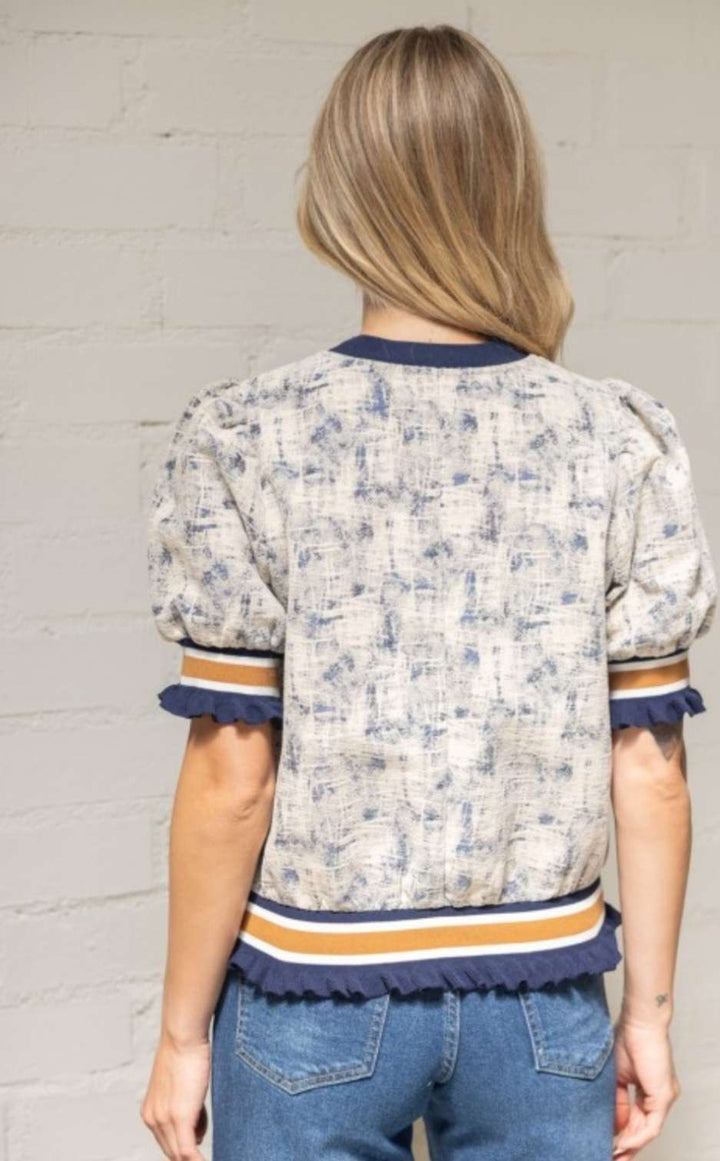 Stylish women’s blue tapestry print top with elastic striped hem – casual chic blouse for everyday wear.