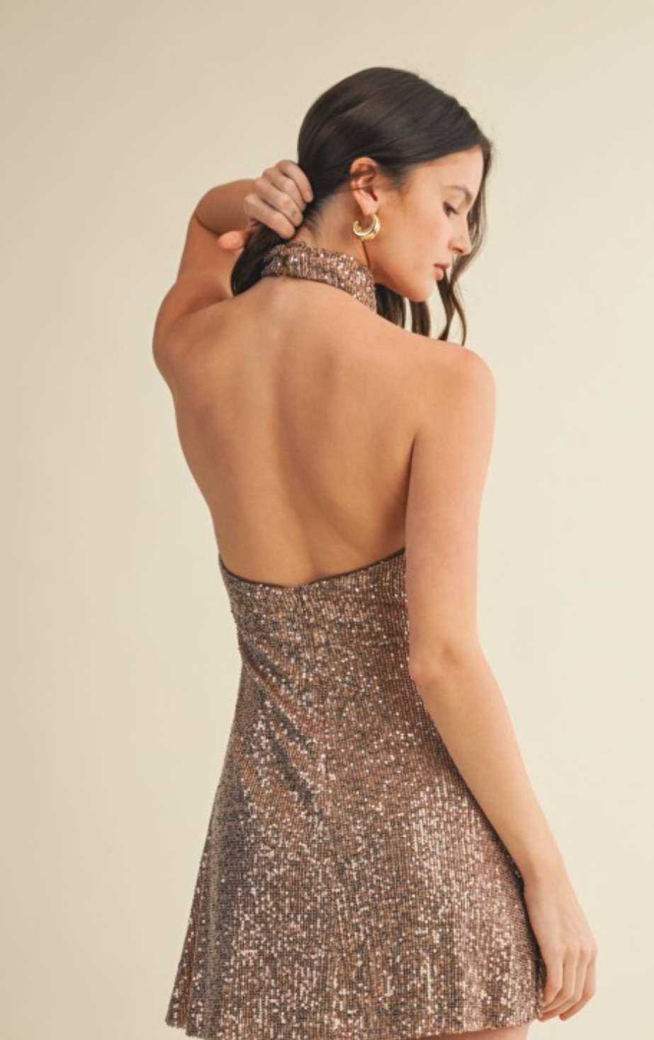 Copper sequin halter neck mini dress for women – sleeveless, sparkling party dress with fitted silhouette, perfect for evening events, clubbing, or special occasions.