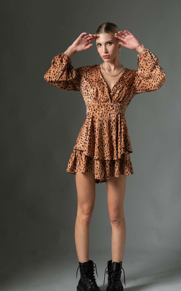 Trendy leopard print ruffle romper designed for casual outings, featuring soft fabric and flattering ruffle trim