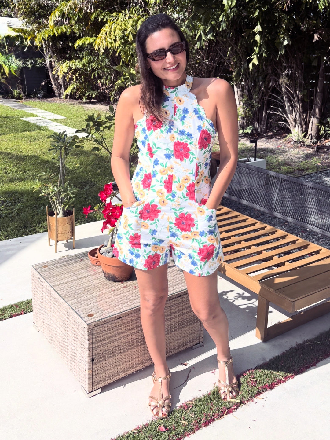 Girl in white floral romper 