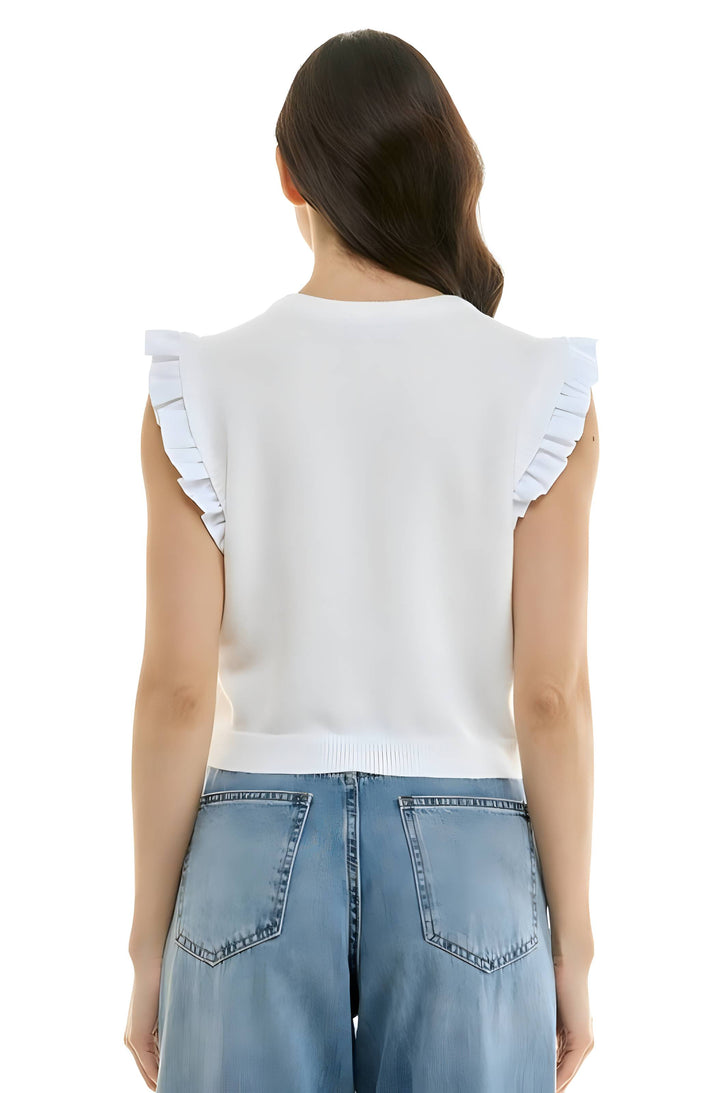 A woman shown from the back wearing a white sleeveless knit top with ruffled shoulder details and light blue jeans, against a plain white background.